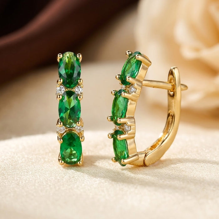 Pendientes de aro verticales esmeralda de oro