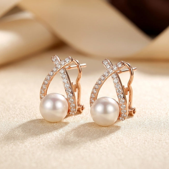 Pendientes de perla cruzada de oro
