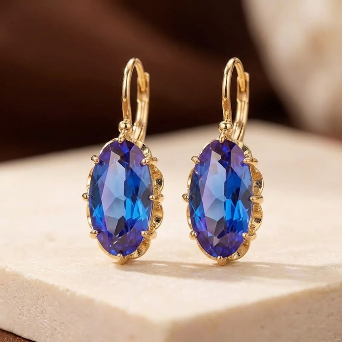 Pendientes de zafiro dorado