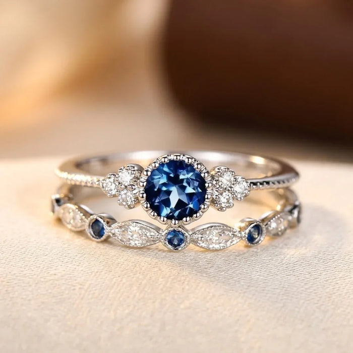 Anillo de halo de zafiro plateado