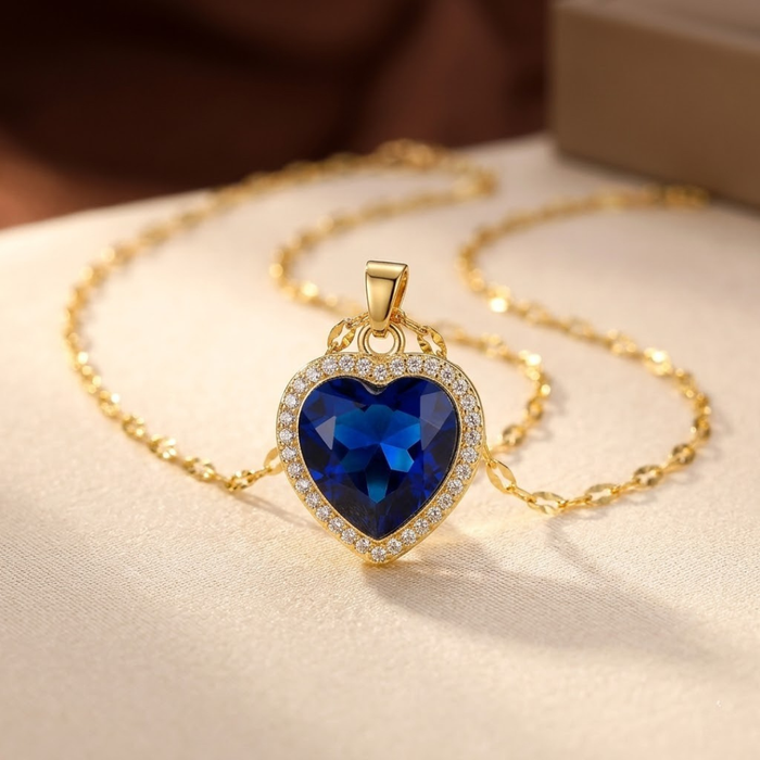 Collar de corazón de zafiro de oro
