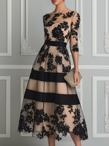 Elegante vestido midi de encaje de corte en A