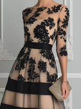Elegante vestido midi de encaje de corte en A