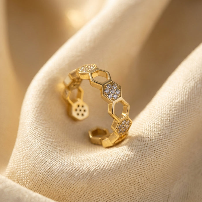 anillo abierto geométrico dorado