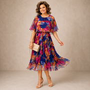 Marianne | Vestido midi colorido con estampado floral