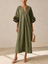 Vestido midi verde oliva con escote en V y llamativas mangas floridas