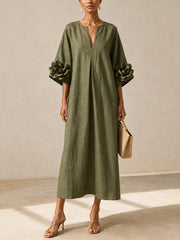 Vestido midi verde oliva con escote en V y llamativas mangas floridas