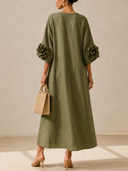 Vestido midi verde oliva con escote en V y llamativas mangas floridas