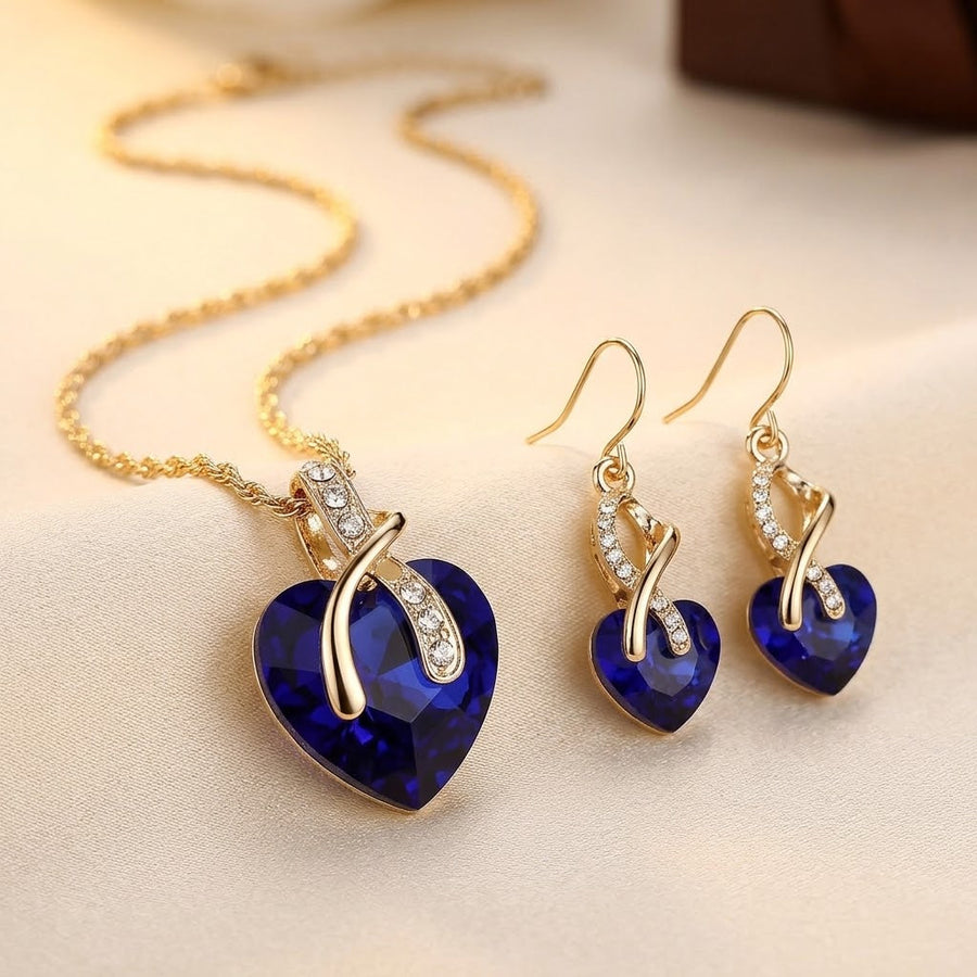 Conjunto de collar y pendientes de corazón de zafiro de oro