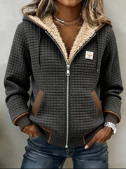 Sandra | Chaqueta acolchada con forro de sherpa, capucha y cremallera