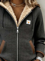 Sandra | Chaqueta acolchada con forro de sherpa, capucha y cremallera